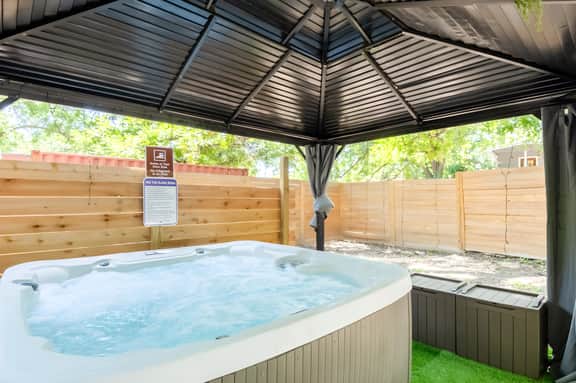 Spacious 5BR Gem w/ Hot Tub Steps from Downtown